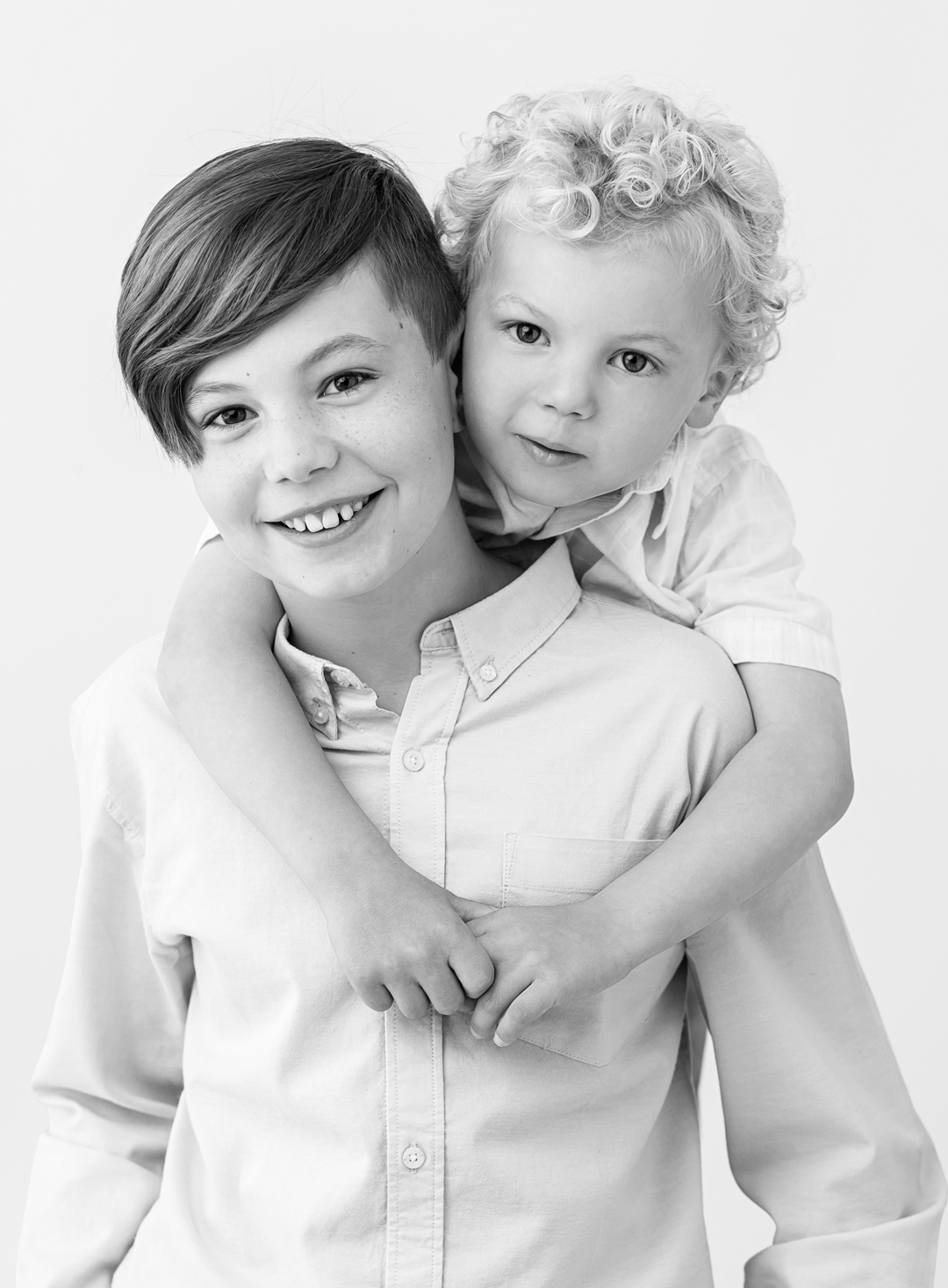 Sibling brothers black and white photo