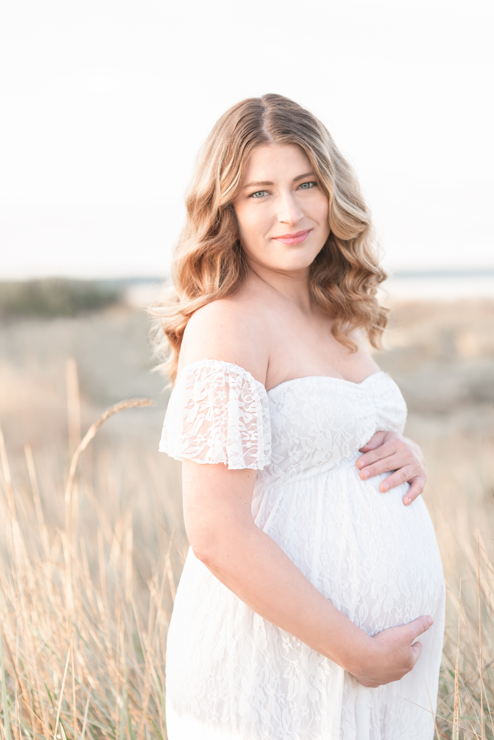 Maternity photos on the sunshine coast bc in a field.