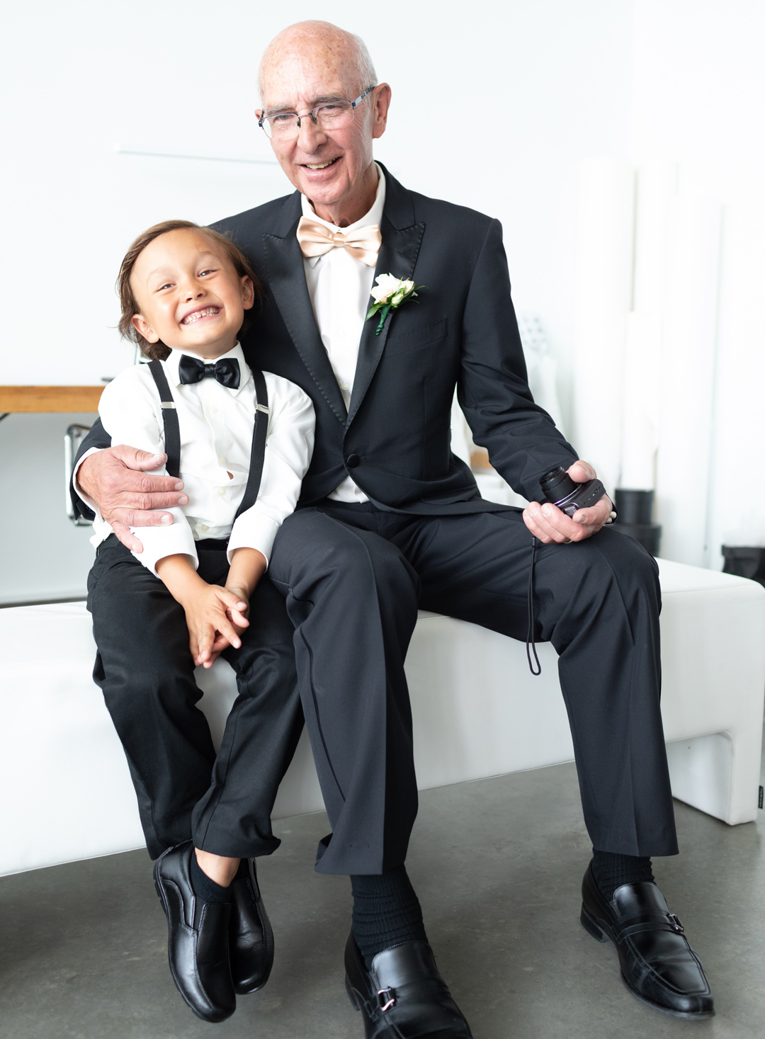 ring bearer and grandfather getting ready