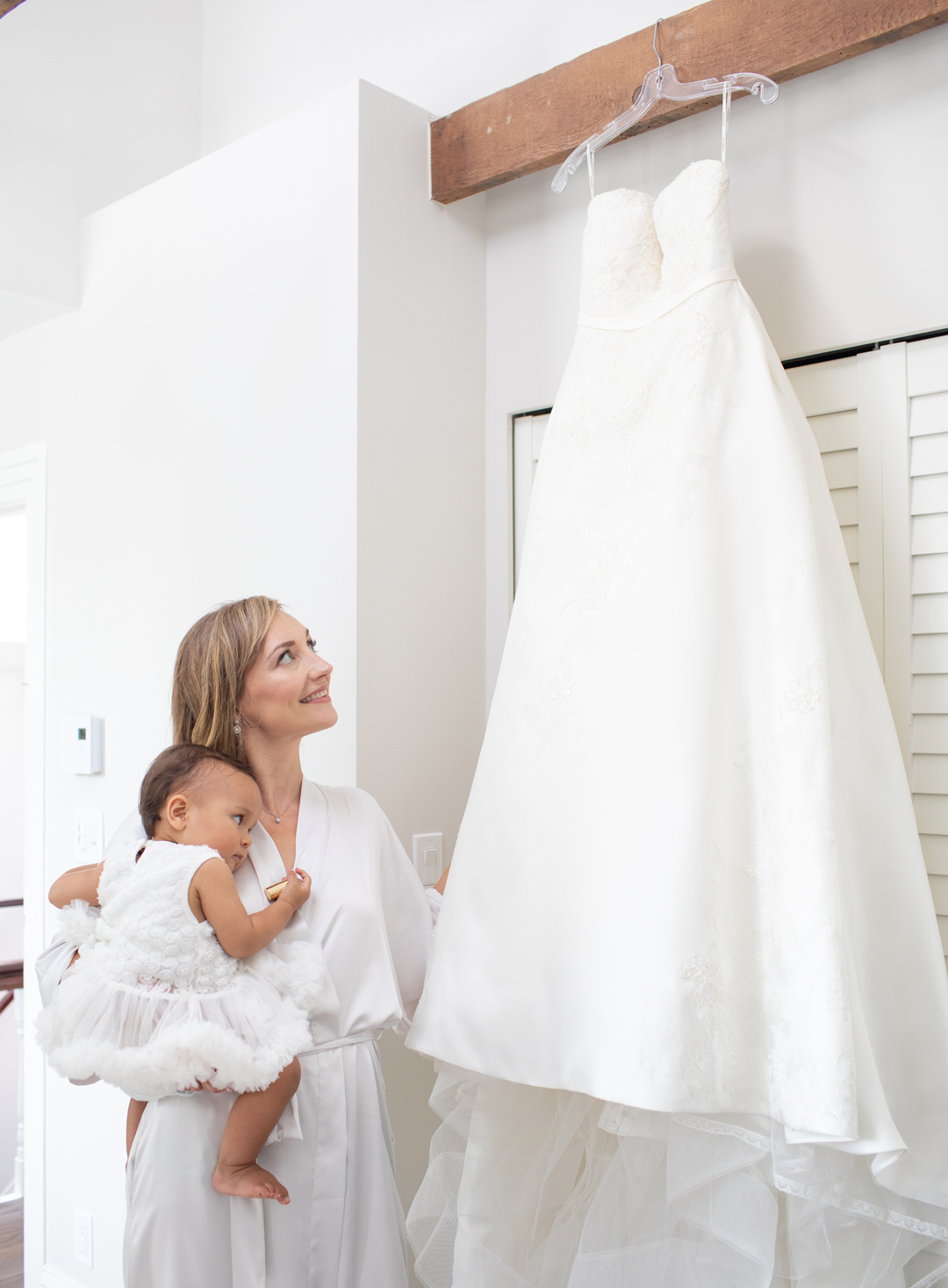 Bride and her daughter looking at wedding gown Sunshine Coast BC wedding