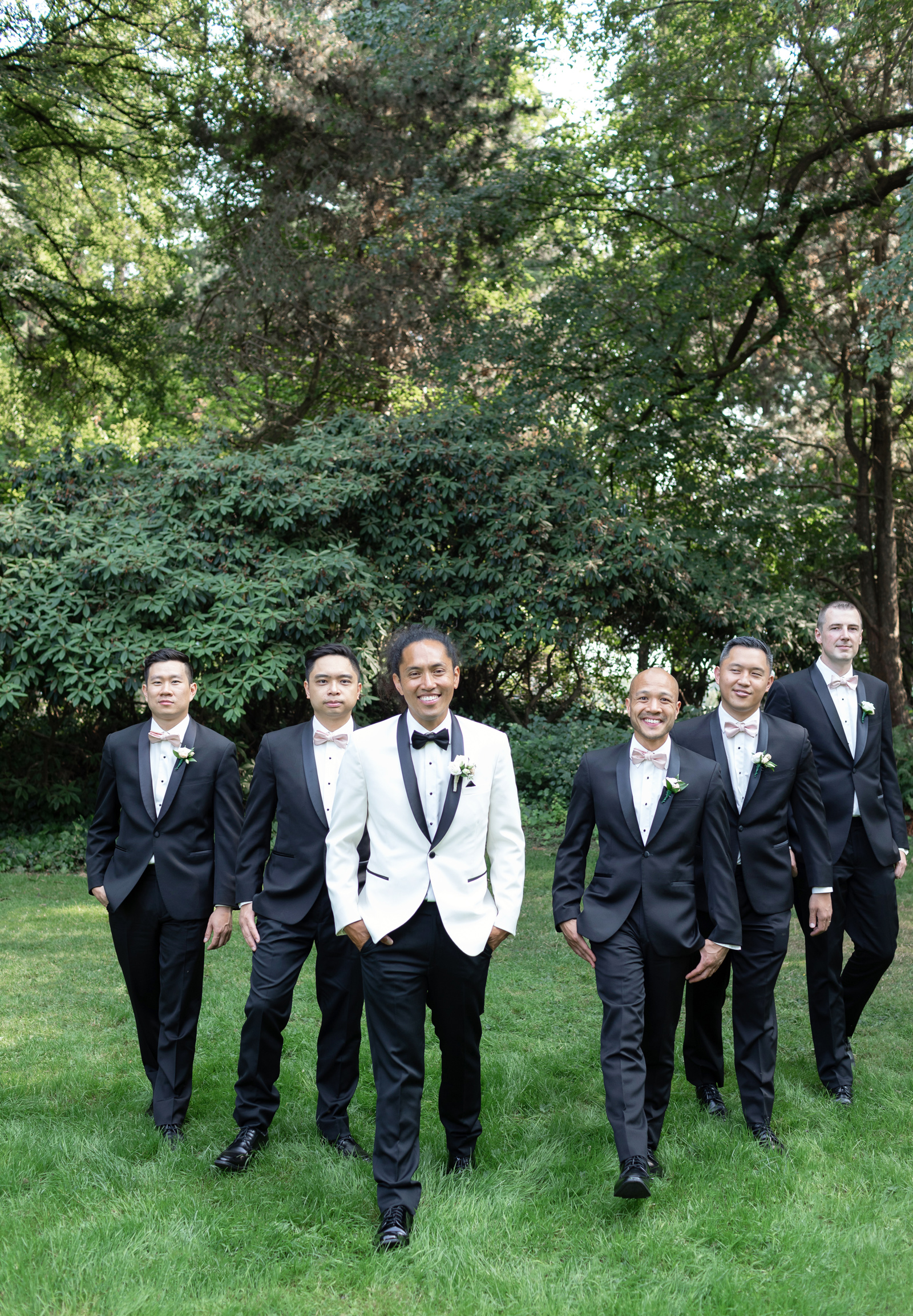 Groom and groomsmen walking