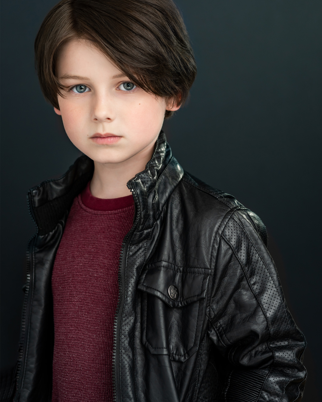 Riverdale's Dagwood Cooper Tough kid headshot of actor wearing a leather jacket