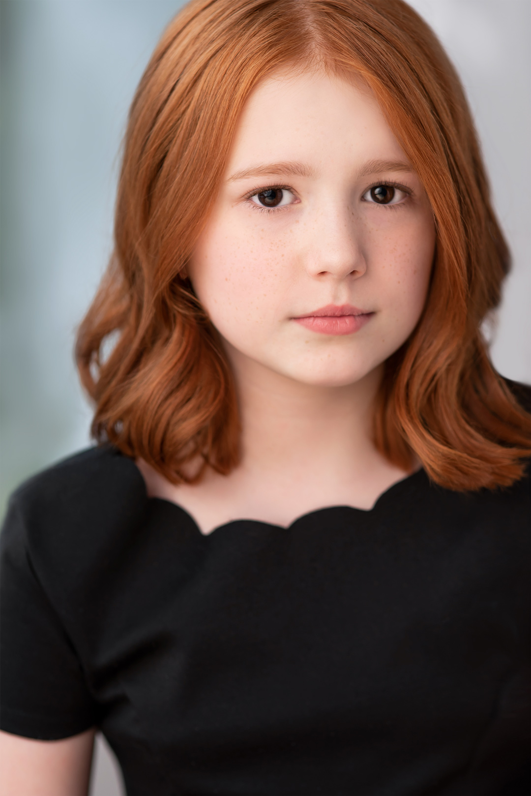 Professional headshot of redhead child actor Daphne Hoskins from Brahms the boy II