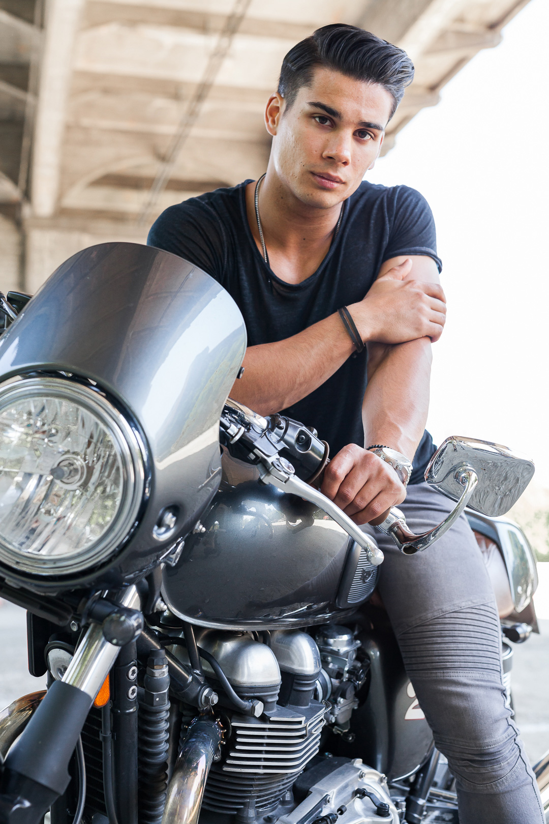 Editorial image of actor Drew Ray Tanner on a Triumph motorcycle