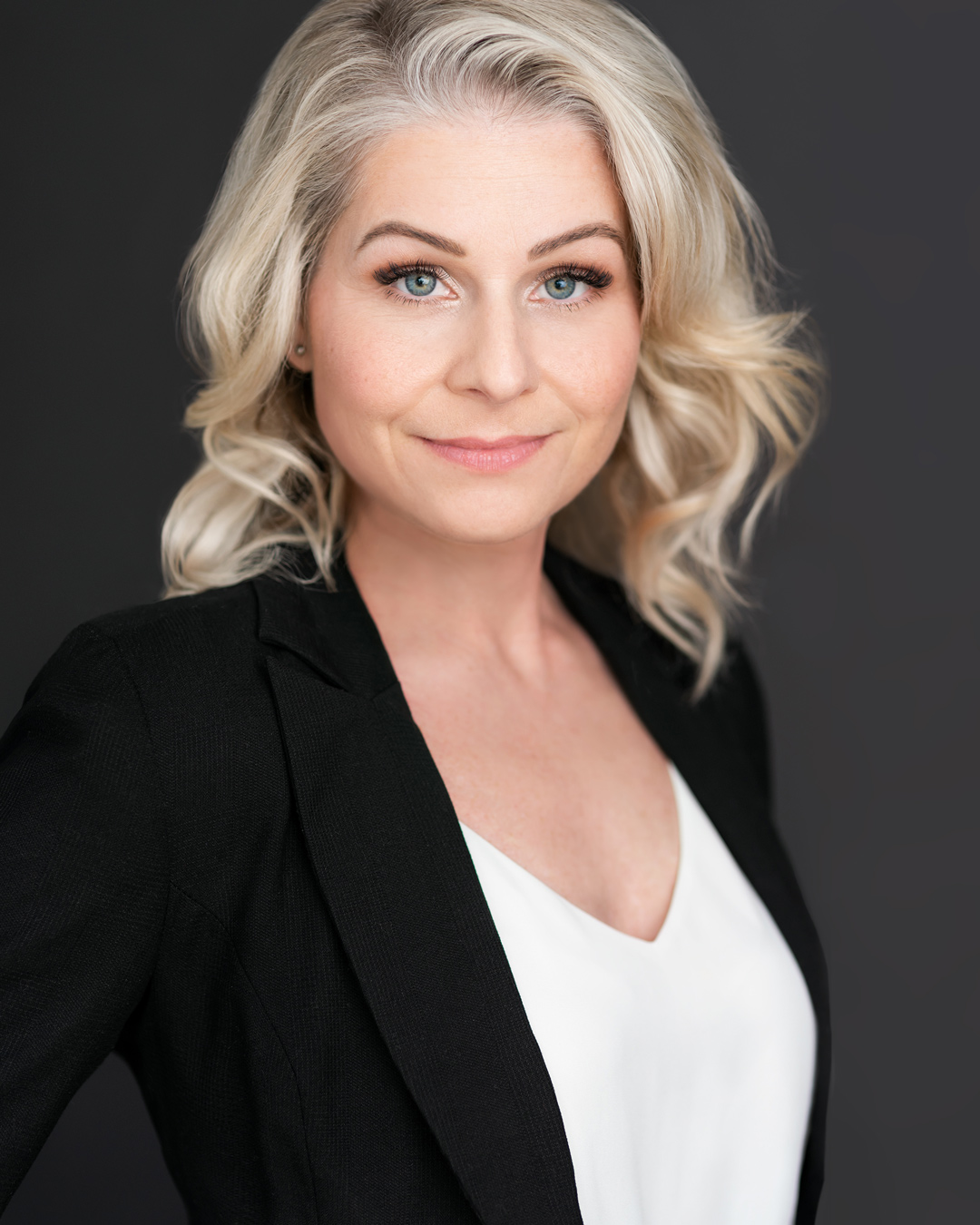 Jessica Storteboom a blonde corporate woman headshot