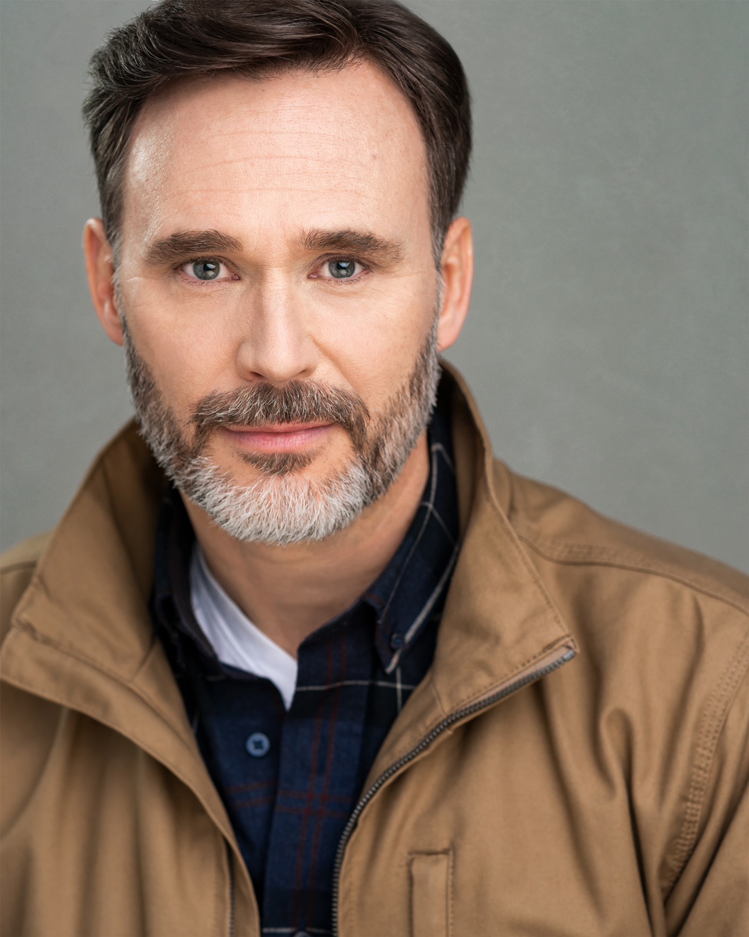 Wholesome looking male Hallmark actor Stu James headshots