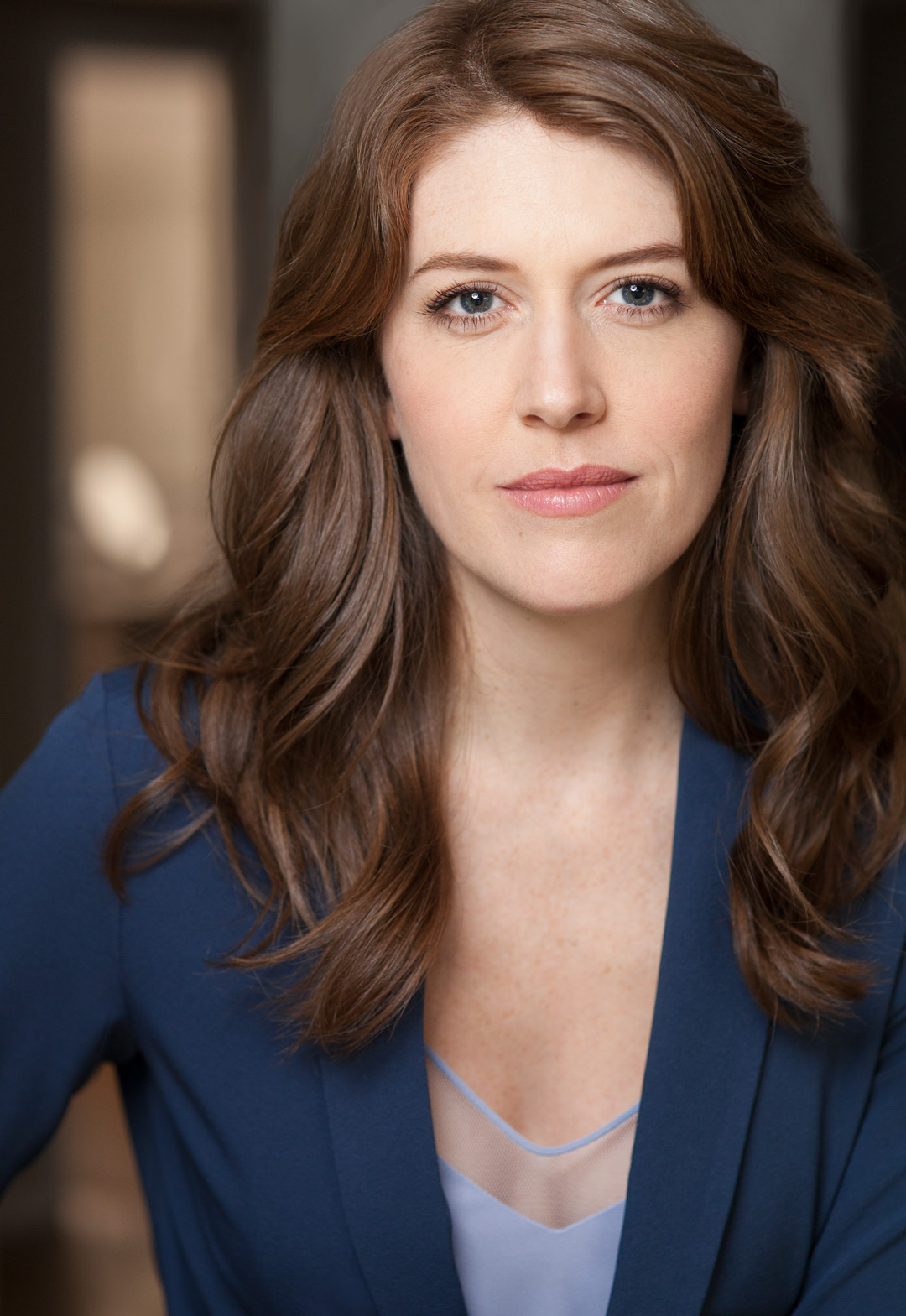 Reporter or business headshot of brunette woman