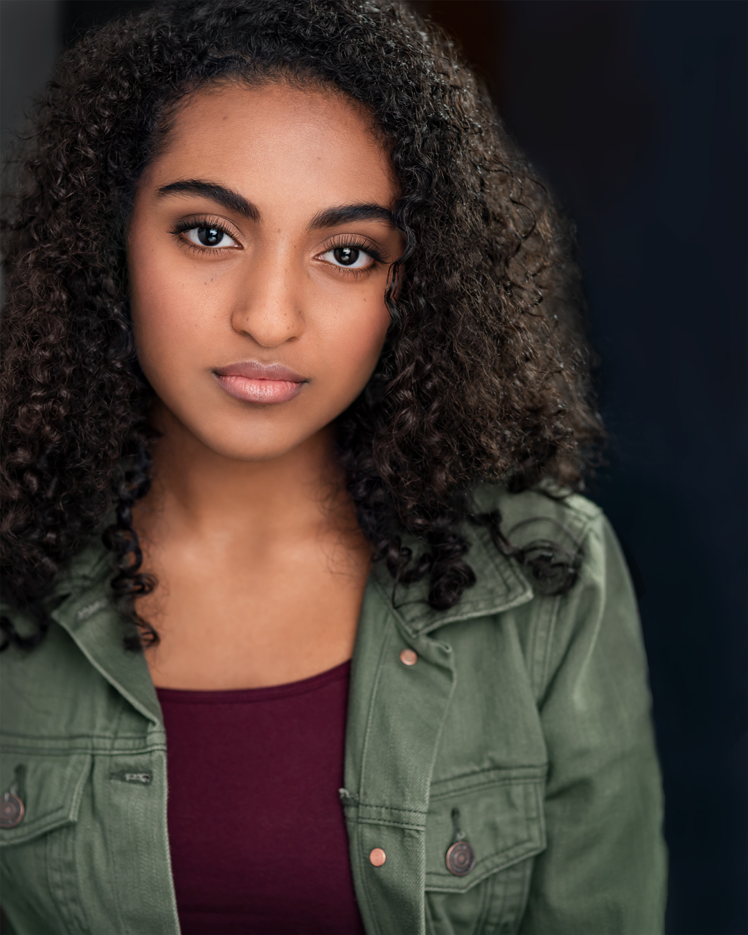 Ethnic actress Uma Kaler with afro scifi headshot